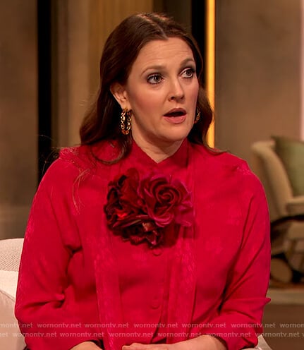 Drew's pink tie neck blouse on The Drew Barrymore Show