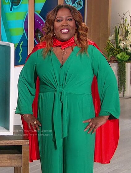 Sheryl’s green tie waist jumpsuit on The Talk