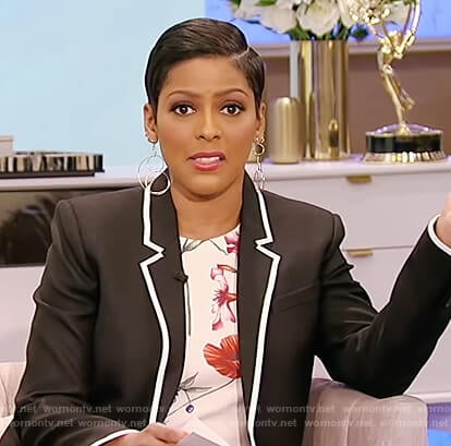 Tamron’s floral top and black contrast trim blazer on Tamron Hall Show