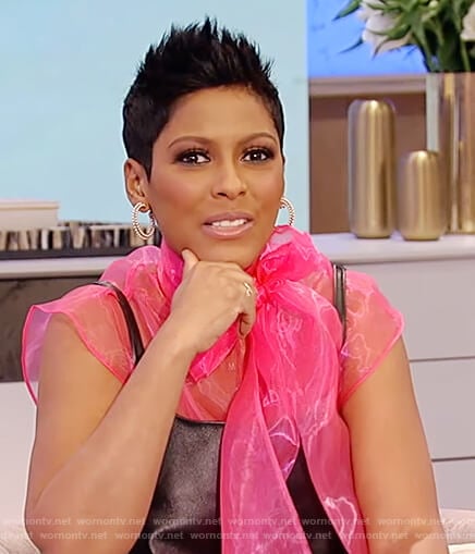 Tamron's black leather dress and pink tulle top on Tamron Hall Show