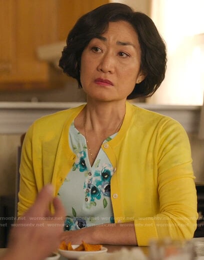 Mrs. Kim's green floral henley top on Kims Convenience