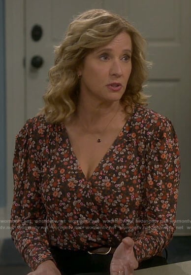 Vanessa’s red floral wrap top on Last Man Standing