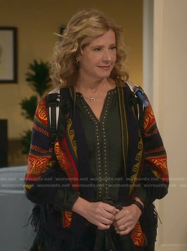 Vanessa’s green studded v-neck top on Last Man Standing