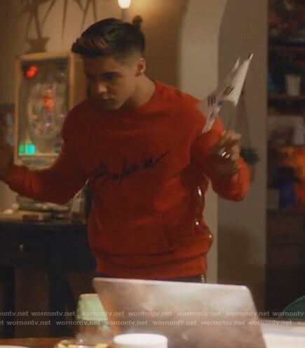 Vivek’s red Balmain signature sweatshirt on Grown-ish