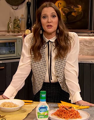 Drew’s white contrast tie neck blouse and polka dot skirt on The Drew Barrymore Show