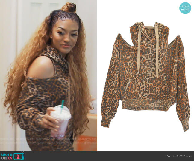 Tricia Cold Shoulder Leopard Print Hoodie by NSF worn by Drew Sidora  on The Real Housewives of Atlanta