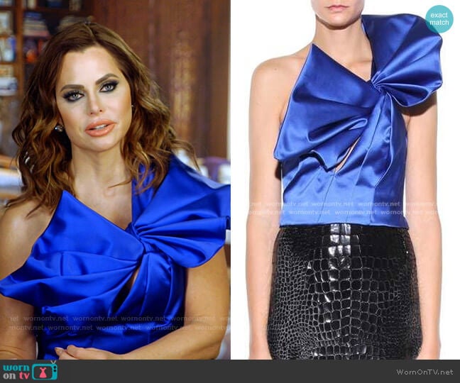 Silk-Satin One-Shoulder Blouse by Saint Laurent worn by D’Andra Simmons on The Real Housewives of Dallas