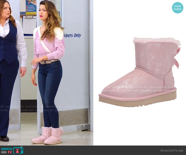 Bailey Bow Ii Shimmer Ankle Boot by Ugg worn by Cheyenne (Nichole Bloom) on Superstore