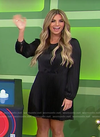 Amber’s black long sleeved pleated dress on The Price is Right