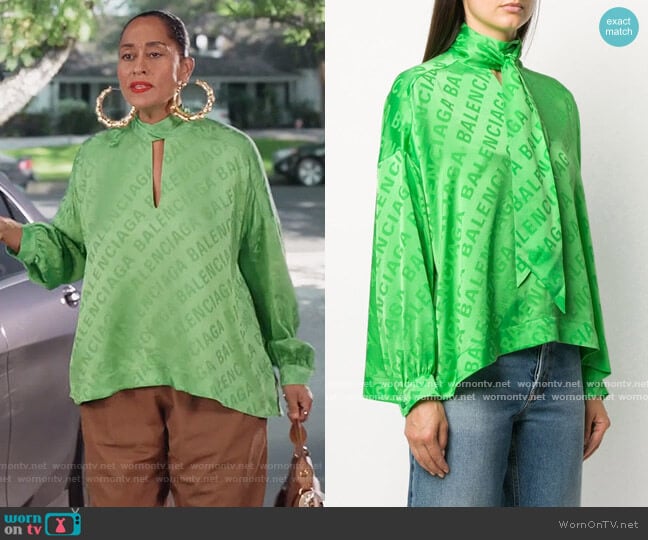 Logo-print Silk Blouse by Balenciaga worn by Rainbow Johnson (Tracee Ellis Ross) on Black-ish