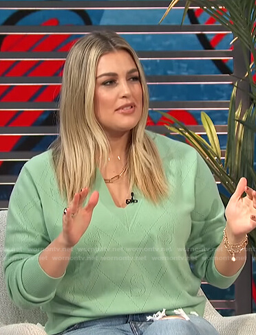 Carissa’s green v-neck sweater on E! News Daily Pop