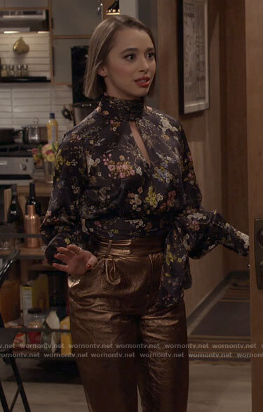 Celia’s black floral top and gold pants on Call Your Mother