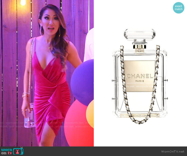 No.5 Perfume Bottle Clutch by Chanel worn by Tiffany Moon  on The Real Housewives of Dallas