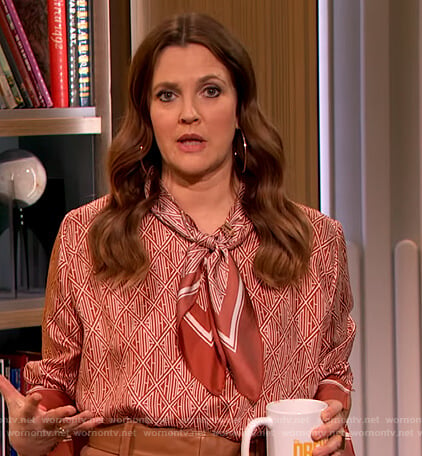 Drew’s red printed tie neck blouse on The Drew Barrymore Show