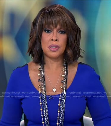 Gayle King’s purple long sleeved dress with black back on CBS Mornings