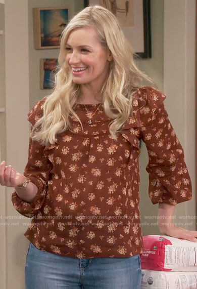 Gemma's brown floral blouse on The Neighborhood