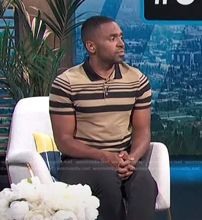 Justin’s black and beige striped polo shirt on E! News Daily Pop