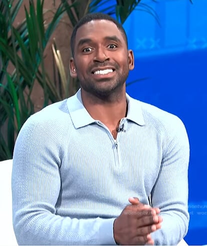 Justin’s blue ribbed quarter-zip sweater on E! News Daily Pop