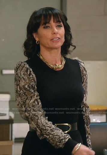 Kathleen's black snake print sleeve top on Good Trouble