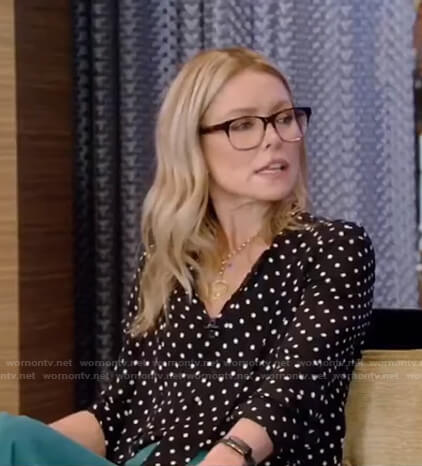 Kelly's black polka dot blouse and green pants on Live with Kelly and Ryan