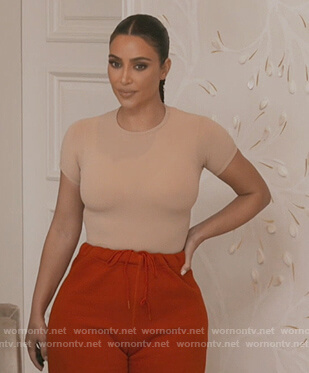 Kim’s beige tee on Keeping Up with the Kardashians