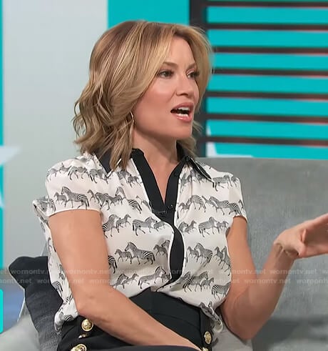 Kit's zebra print blouse and button detail pants on Access Hollywood