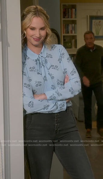 Mandy's blue floral blouse and grey jeans on Last Man Standing