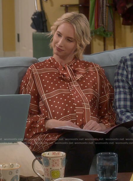 Mandy's brown polka dot and check tunic top on Last Man Standing