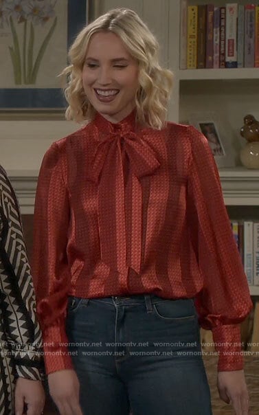 Mandy's red striped tie neck blouse on Last Man Standing