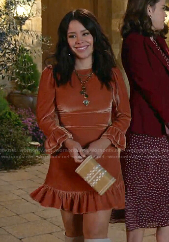 Mariana’s orange velvet mini dress on Good Trouble