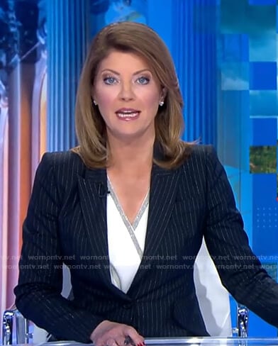 Norah’s metallic pinstripe blazer and pant suit on CBS Evening News