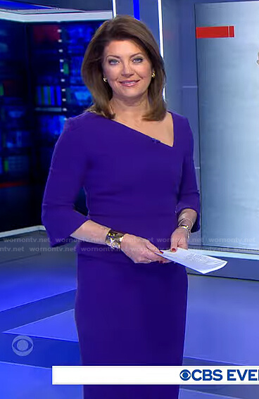 Norah's blue asymmetric v-neck dress on CBS Evening News