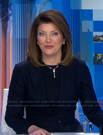 Norah’s navy belted blazer on CBS Evening News