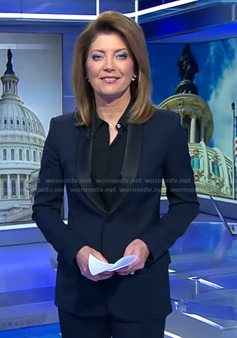 Nora’s navy contrast shawl collar blazer on CBS Evening News