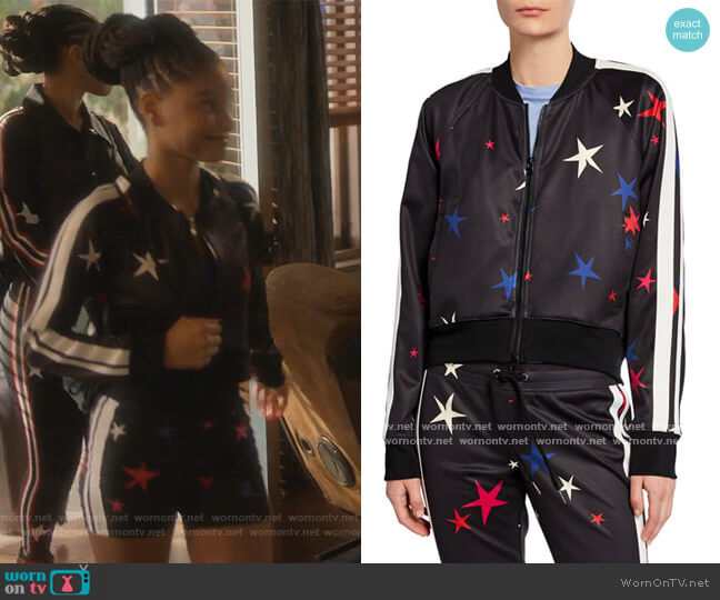 Star Side-Stripe Raglan-Sleeve Crop Track Jacket by Pam & Gela worn by Skylar Forster (Halle Bailey) on Grown-ish