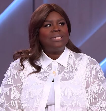 Retta’s white fringe trim blouse and pants on The Kelly Clarkson Show