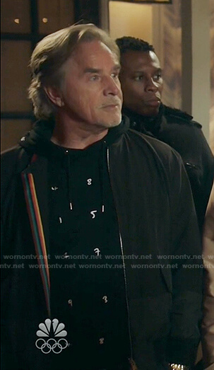 Rick's black embroidered number hoodie and colorblock bomber jacket on Kenan