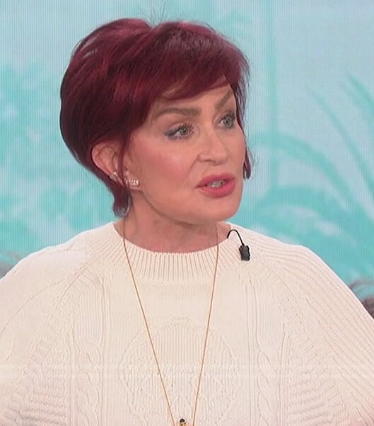 Sharon’s white skull knit sweater on The Talk