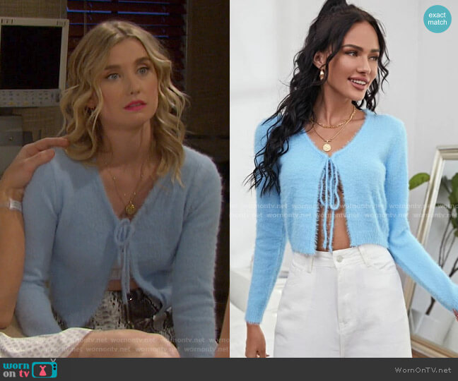 WornOnTV: Claire's blue tie front cardigan and snake print skirt