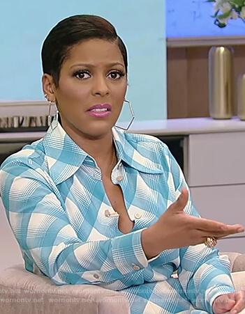 Tamron’s blue plaid blouse and skirt on Tamron Hall Show