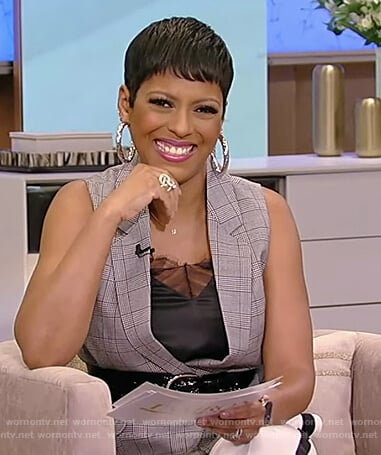 Tamron’s gray plaid vest and white pants on Tamron Hall Show