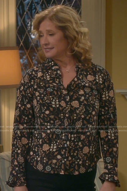 Vanessa's black floral button down blouse on Last Man Standing