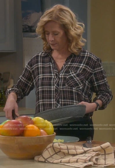 Vanessa’s black and pink plaid shirt on Last Man Standing