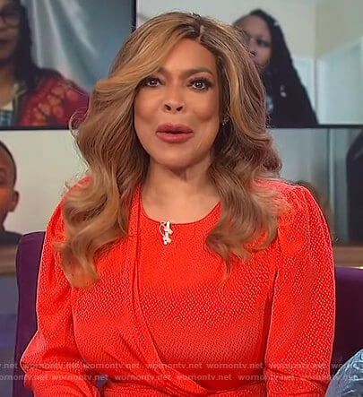 Wendy’s red jacquard dress with slit on The Wendy Williams Show