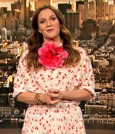 Drew’s floral print blouse and pleated skirt on The Drew Barrymore Show