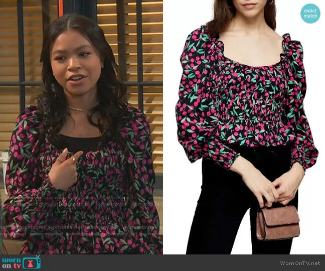 Cherry Smocked Prairie Blouse by Topshop worn by Nia Baxter (Navia Robinson) on Ravens Home