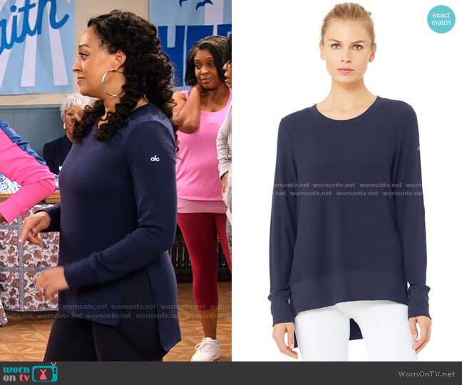 Glimpse Long Sleeve Top by Alo Yoga worn by Cocoa McKellan (Tia Mowry-Hardrict) on Family Reunion