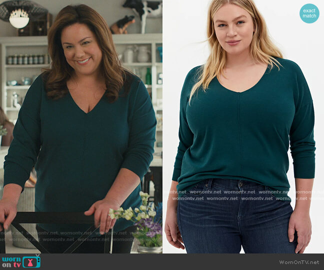 Katie’s teal v-neck sweater on American Housewife