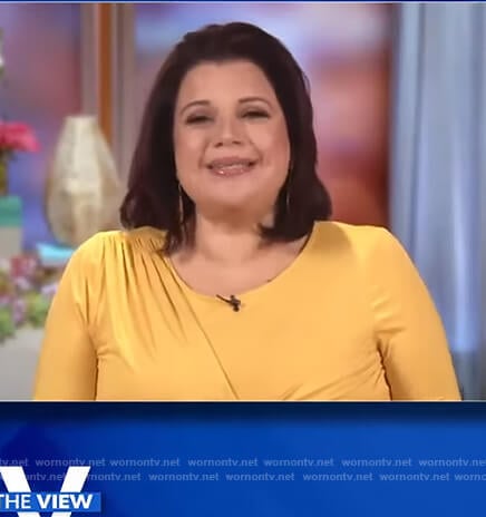 Ana’s yellow twisted front top on The View