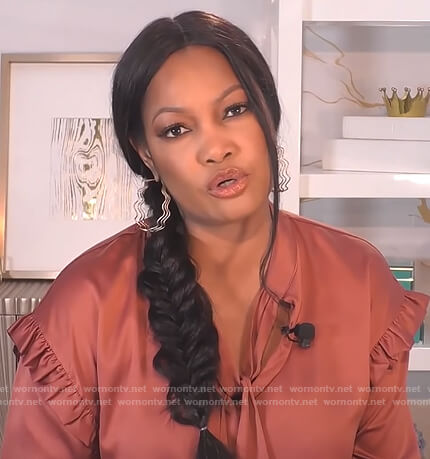 Garcelle's satin ruffle tie blouse on The Real